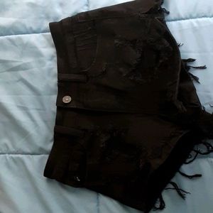 Black ripped denim shorts